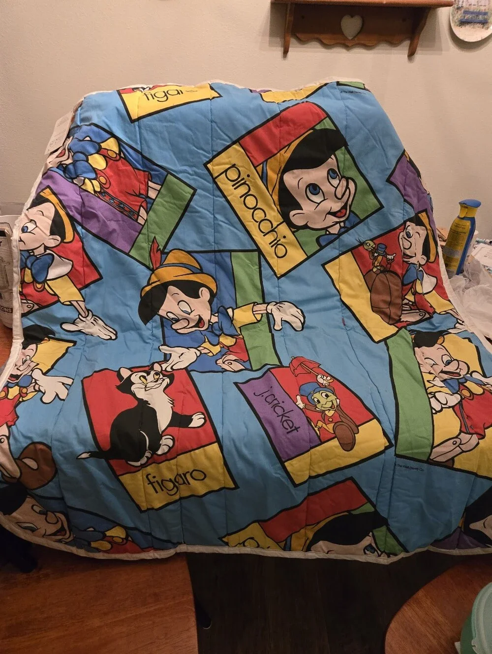Disney Pinocchio reversible Cuddle Quilt  featuring Figaro the cat.
